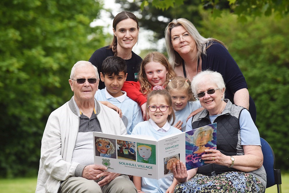 Local children and older people come together to fill time capsule for Solihull Retirement Village