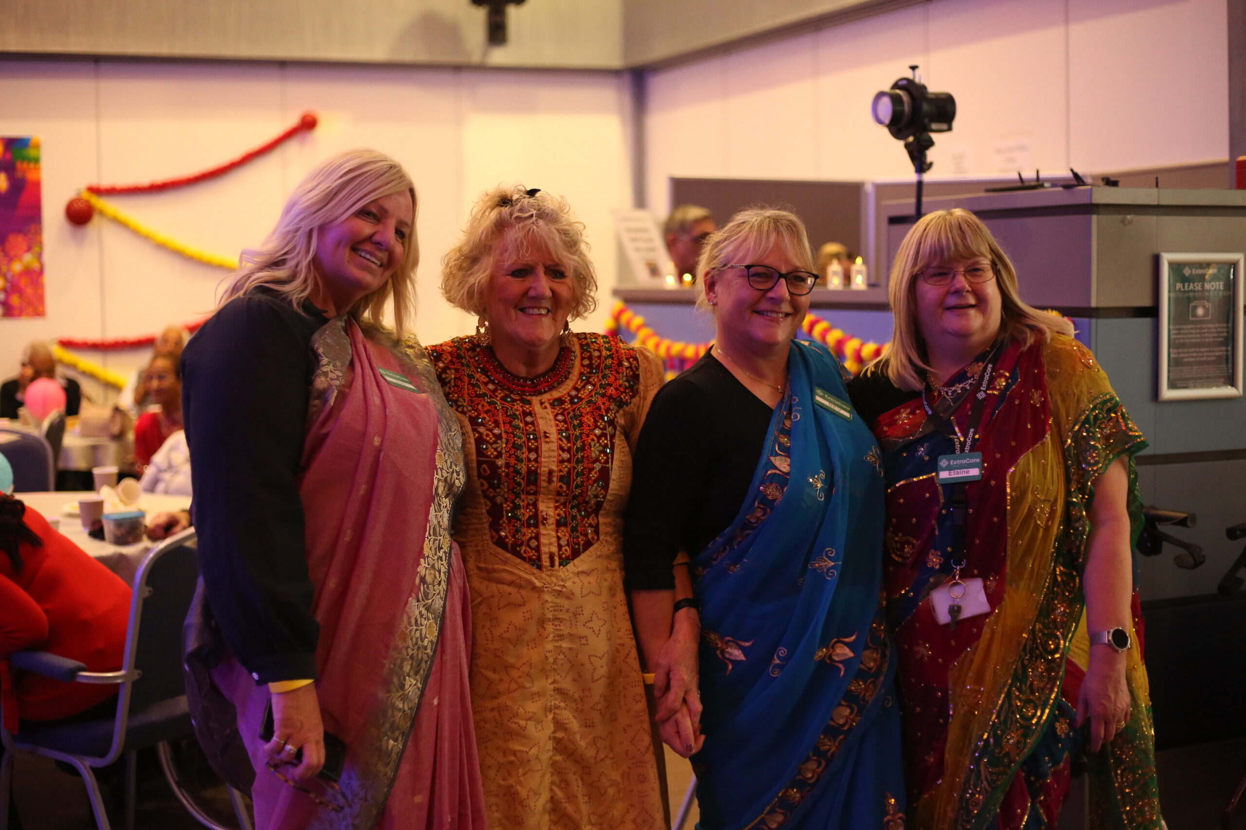 Staff wearing indian dress.