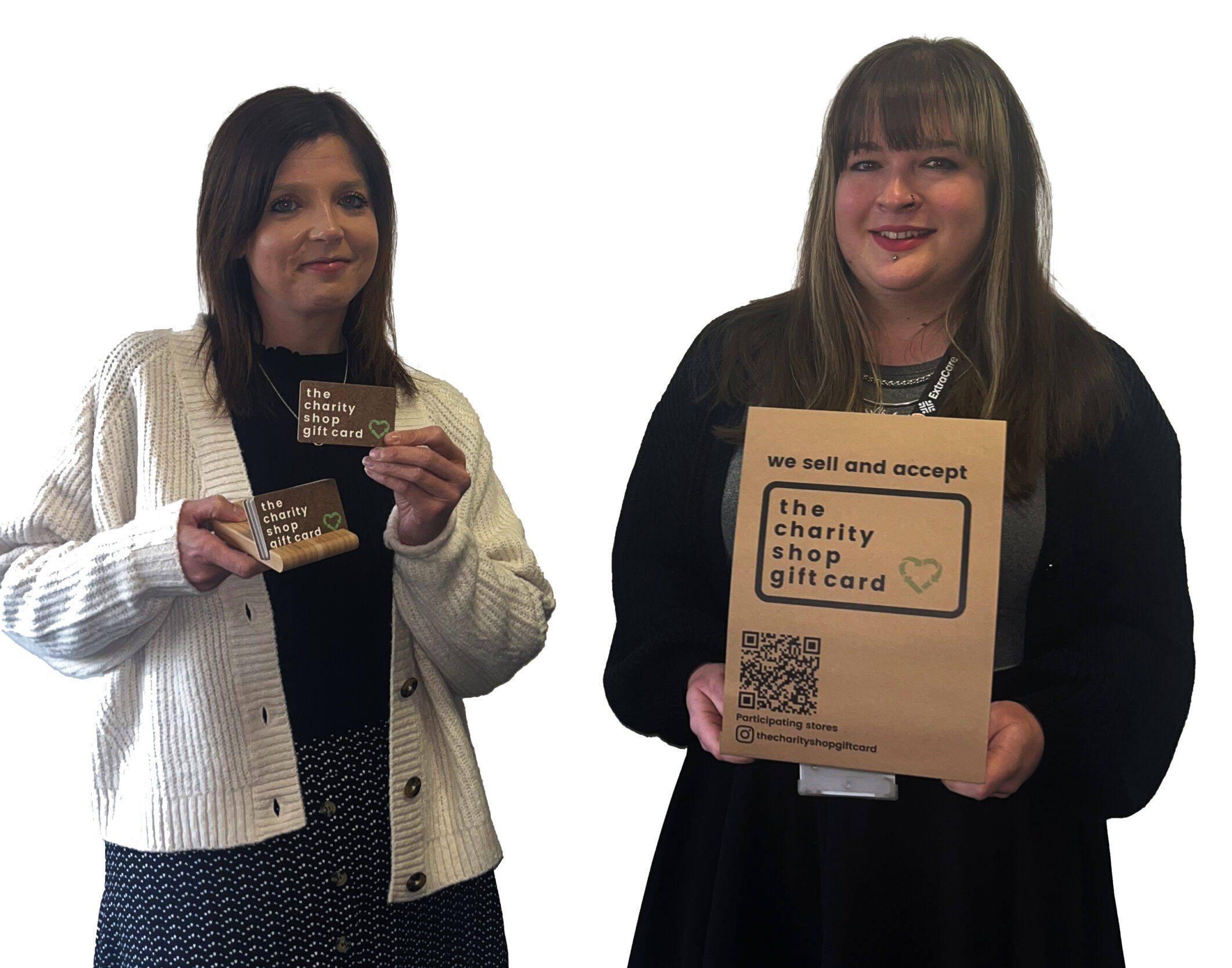 Two staff members from the retail team holding the gift card