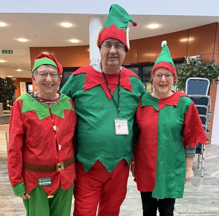 Staff enjoying the festive season in elf costume.