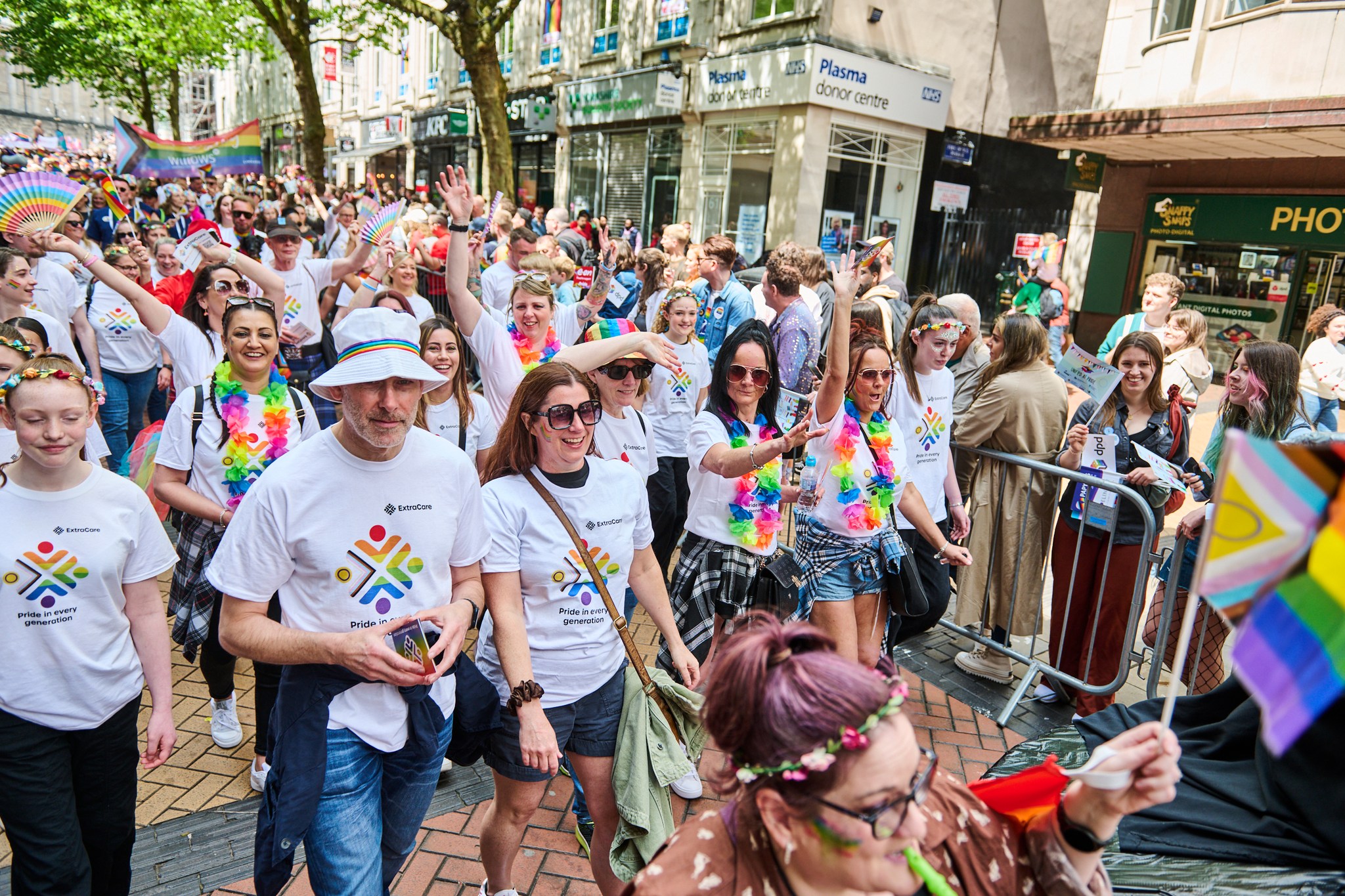 The group walking through Pride.