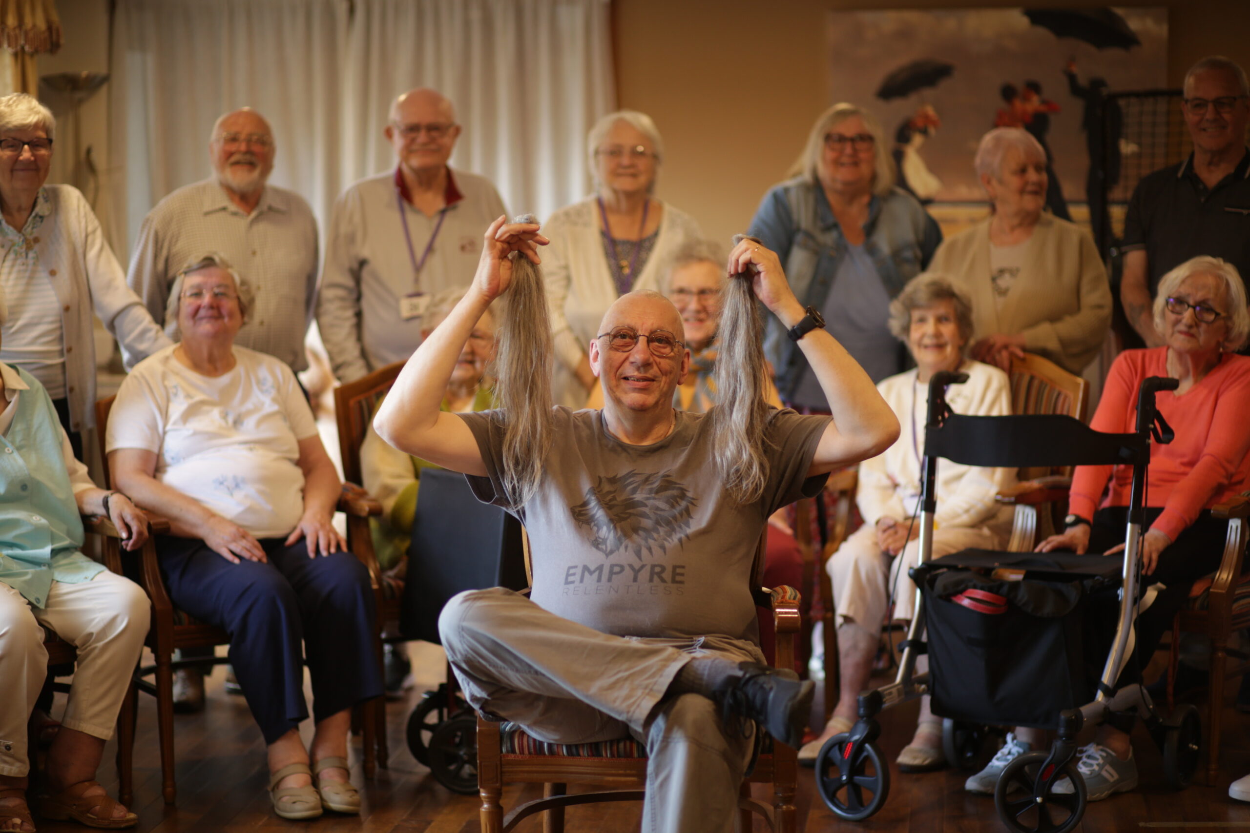 Gary sat at the front with all the residents gathered behind him.